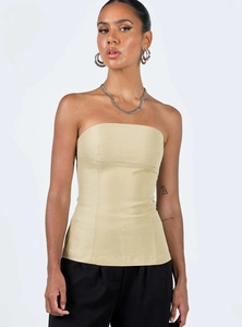 Close-up of beige corset-style tube top with structured tailoring and back slit design