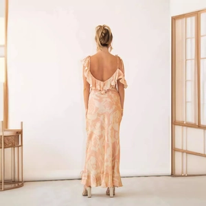 Elegant backless floral slip maxi dress with cascading ruffles and abstract floral prints