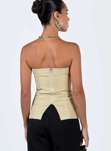 Detail of khaki tube top featuring a long silver back zipper and back slit design