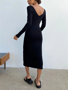 Detail of the deep V-back design and ribbed knit texture on a black slim-fit midi dress