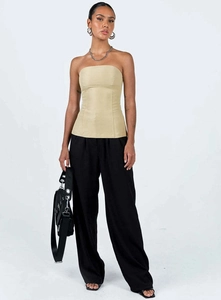 Detail of slim-fit beige tube top with vertical seams and split back design