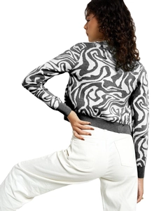 Women's long sleeve knit cardigan featuring grey marble patterns and ribbed cuffs