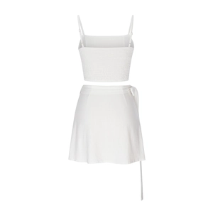 Detailed back view of white smocked camisole top and wrap skirt two-piece summer set