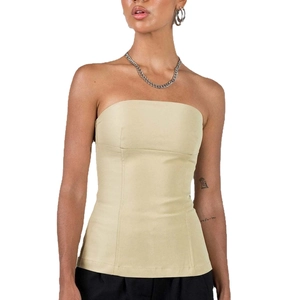 Elegant beige strapless tube top with structured bustier seams for a sleek silhouette