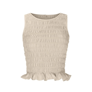 Detail of smocked texture and peplum hem on sleeveless slim fit women top