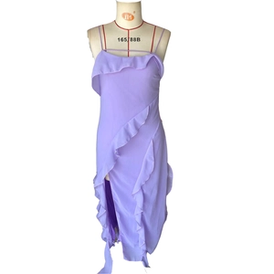 Light purple off-shoulder slit dress with ruffles and spaghetti straps on mannequin
