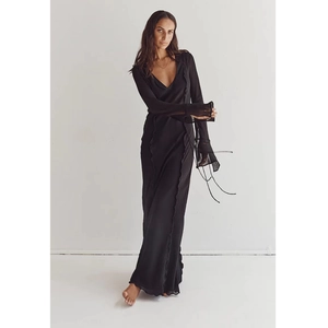 Elegant black V-neck maxi dress with sheer long sleeves and tiered ruffle detailing