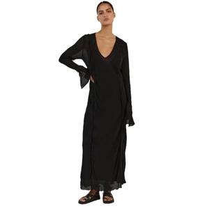Elegant black V-neck maxi dress with long sheer sleeves and flowing minimalist silhouette