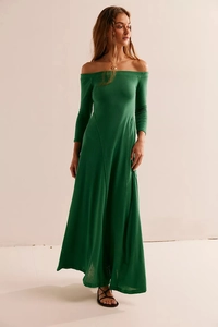 Floor-length dark green off-shoulder dress with long sleeves and a slim fit silhouette