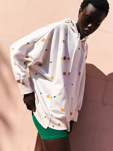 Women's oversized floral print hoodie with drawstring hood and large front pocket