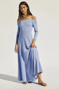 Detail of the light blue off-shoulder long dress featuring soft knitted texture and A-line hem