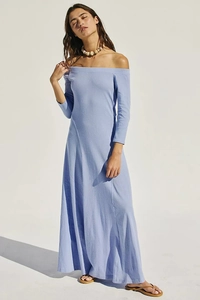 Detail of off-shoulder lilac knit maxi dress showing long sleeves and elegant slim silhouette