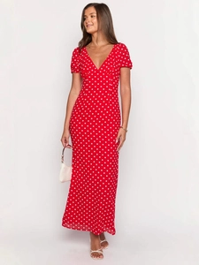 Elegante abito lungo rosso con scollo a V, pois bianchi e maniche a sbuffo da donna