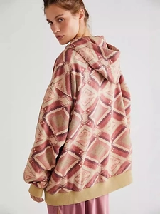 Loose oversized women's hoodie with brown geometric pattern and khaki ribbed trim