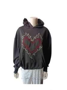 Oversized black hoodie for women featuring a detailed red and white heart flame embroidery
