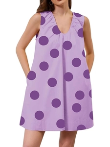 Light purple V-neck sleeveless A-line dress with large dark purple polka dots and side pockets