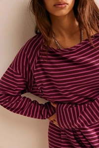 Macro detail of casual boat neck design and purple striped knit fabric texture