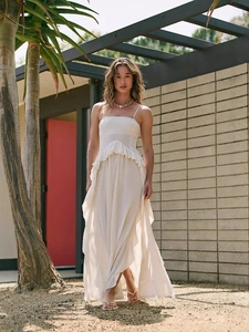 Elegant beige bohemian maxi dress with ruffles and split hem for summer vacation wear