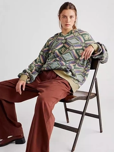 Vintage geometric print oversized hoodie with kangaroo pocket and brown wide-leg pants
