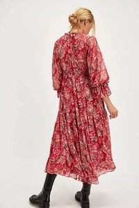 Back view of a red floral chiffon maxi dress with ruffled tiers and elastic waist