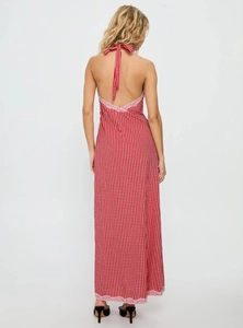 Detail of red gingham halter dress showing the open back and white lace trim edges