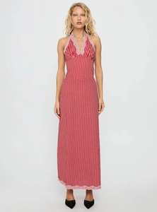 Detail of red gingham halter maxi dress with pink lace trim and slim fit design