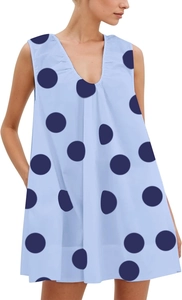 Detailed view of the light blue A-line dress featuring large dark blue polka dots and V-neck