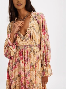 Bohemian floral V-neck maxi dress with ruffles and lantern sleeves in apricot yellow