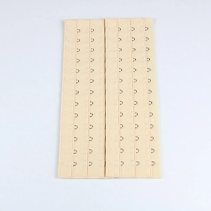 Estensore per corsetto beige con 13 file di 3 ganci per bustini e intimo modellante