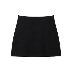 Minimalist black knitted A-line mini skirt with a dense texture on a white background