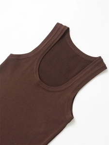 Detail view of dark brown rib-knit tank top featuring a classic wide scoop neckline