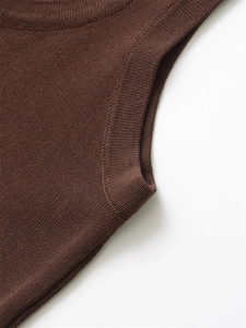 Detail of dark brown sleeveless knit top featuring ribbed neckline and flat stitch texture
