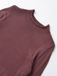 Detail of burgundy knit sweater showing ribbed mock neck and fine fabric texture