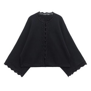Women's black loose knit cardigan with elegant lace trim and button-down front