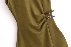 Detail of olive green twill midi dress showing waist side straps with gold buckles