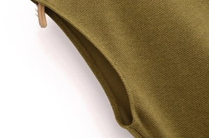 Close-up of olive green knit midi dress showing precision stitching and fabric texture
