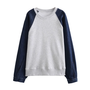 Women's two-piece set featuring a grey raglan sleeve sweatshirt with denim contrast