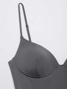 Close-up of charcoal gray camisole featuring adjustable straps and molded cup details