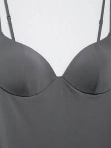Detailed view of dark gray camisole featuring thin straps and built-in padded cups