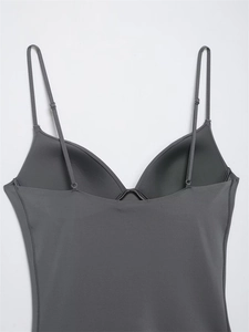Detail of dark grey camisole with adjustable thin straps and integrated molded cups