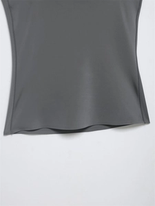 Detailed view of the dark grey tank top hem with professional stitching and stretch fabric
