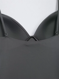 Detailed close-up of dark grey V-neck camisole with thin straps and padded cups