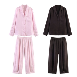 Casual women's long sleeve shirt and pants set in pastel pink and deep brown