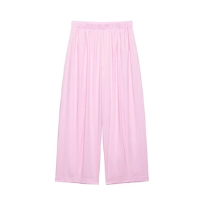 Detail of light pink wide leg pants with elastic waist and vertical pleats texture