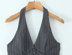 Detail of grey pinstripe halter vest with deep V-neck and single breasted button