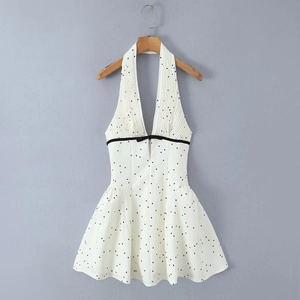 French style white halter neck dress with black polka dots and pleated V-neckline