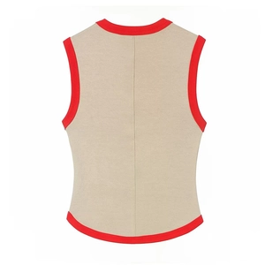 Sleeveless beige cropped top with contrasting red trim and vintage sporty design