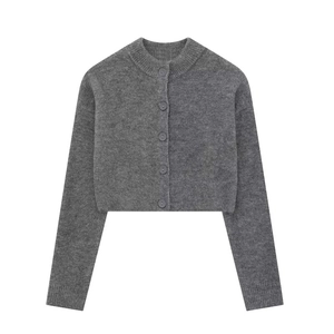 Close-up of dark grey knit cardigan with round neck and five matching button closures