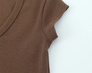 Detail view of stitched U-neckline and fine knitted texture on slim brown T-shirt
