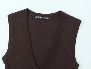 Detail of V-neckline and knit texture on this dark brown sleeveless fashion vest top